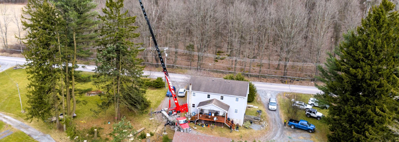 aerial view of a truck working on a tree removal
